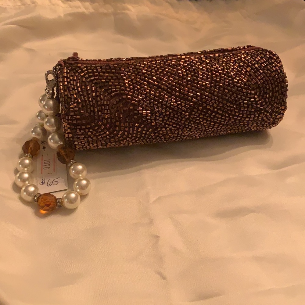 NWT Yinlin copper beaded wristlet.